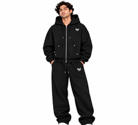 Ensemble de survêtement sportif oversize noir pour homme, avec sweat à capuche zippé à poches et clous décoratifs, en coton épais, personnalisable, vente en gros