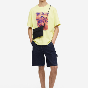 เสื้อยืดคอกลมแขนยาวทรงโอเวอร์ไซส์สำหรับผู้ชาย กันลม พิมพ์โลโก้ตามสั่ง มีกระเป๋า ดีไซน์สีพื้น - Product Image 1