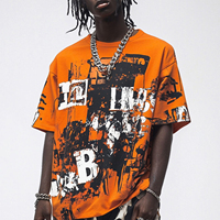 T-shirt streetwear orange pour homme, coupe classique, manches courtes, motif lettres imprimées effet gouttelettes sur le devant, en jersey de coton tricoté, col rond