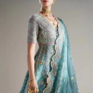 Premium Pakistani Bridle <b>Dress</b> Royal <b>Teal</b> Blue Sculptural Bridal Gown Featuring Bold Structured Padded Shoulders Intricate - Product Image 1