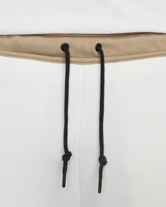 Pantalon de survêtement en molleton blanc pour homme avec empiècements latéraux beiges, taille élastique et cordon de serrage, style décontracté, idéal pour l'automne - Product Image 4