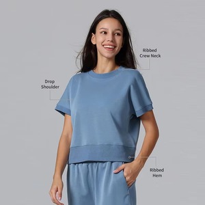 Camiseta de punto azul de manga corta con cuello redondo para mujer, corte crop, ajuste holgado, color liso, transpirable, de algodón y elastano - Product Image 4