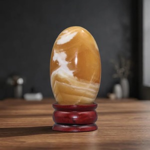 Figura de Shiva Lingam de Aventurina Amarilla en Oferta, con Puntos Negros y Base Dorada, Artículo Coleccionable de Piedra, Decoración para el Hogar - Product Image 1