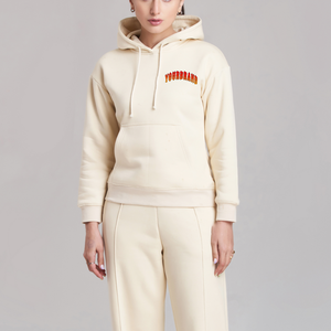 Fabricants de vêtements OEM sur mesure de haute qualité en tissu French Terry pour femmes : Ensemble survêtement avec sweat à capuche court zippé à imprimé en relief et pantalon évasé, États-Unis - Product Image 2