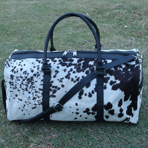 กระเป๋าหนังวัวแบบ unisex ทรงสี่เหลี่ยมผืนผ้า ปิดด้วยซิป หูหิ้วคู่ กระเป๋าเดินทางแฟชั่น ความจุ 20-36 ลิตร - Product Image 6