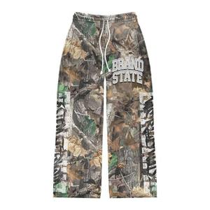 Pantalones de chándal anchos y holgados de camuflaje, estilo hip hop, de cintura media, lavados, personalizados al por mayor, para invierno, con corte acampanado, tipo cargo. - Product Image 1