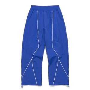 เสื้อแจ็คเก็ตกันลมน้ำหนักเบาแบบ unisex สีน้ำเงินทรงโอเวอร์ไซส์ ชุดเสื้อและกางเกงผ้า soft shell คอตั้ง ซิป ระบายอากาศได้ดี - Product Image 3