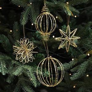 Creative metal holiday ornaments designed with snowflakes, Christmas trees, bells, <b>stars</b>, and festive symbolic patterns - Product Image 1