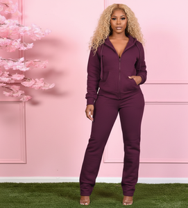 Conjunto de dos piezas casual de invierno para mujer: Chaqueta de manga larga de color liso con cremallera y pantalones elásticos con capucha hasta la rodilla. - Product Image 1