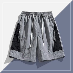 Shorts coupe-vent en polyamide personnalisés, légers, en nylon coloré, shorts d'été pour hommes - Product Image 3