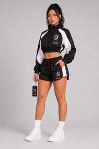 Ensemble coupe-vent court pour femme de haute qualité : veste et short élégants, légers et confortables pour le sport - Product Image 5