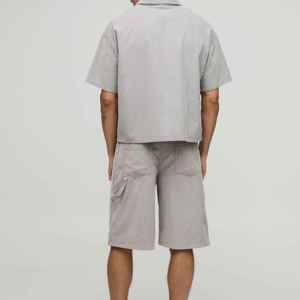 กางเกงยีนส์ขาสั้นผู้ชายแบบสั่งทำ สีพื้น เป็นมิตรกับสิ่งแวดล้อม สำหรับแฟชั่นฤดูร้อน ใส่สบายทุกวัน ผู้ผลิต OEM - Product Image 2