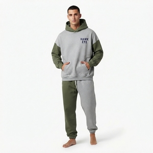 Ensemble décontracté de qualité supérieure pour homme en molleton de coton, comprenant un sweat à capuche oversize à épaules tombantes bicolore et un pantalon de jogging coupe décontractée à blocs de couleur - Product Image 1
