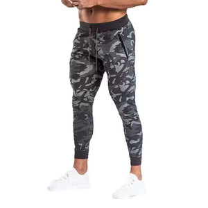 กางเกงฟิตเนสผู้ชายทรงเข้ารูป กระชับรูปร่าง สำหรับวิ่งจ๊อกกิ้ง ความยาว 9 นิ้ว เหมาะสำหรับกิจกรรมกลางแจ้ง กีฬา ลำลอง ทันสมัย ผลิตจากผ้าแคนวาส 100% ผ้าฝ้าย - Product Image 1