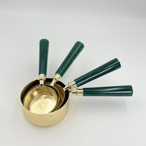 ชุดถ้วยตวงสแตนเลสแบบใหม่ 4 ใบ เคลือบ PVD สีทอง พร้อมด้ามจับเรซิ่น สำหรับร้านอาหาร เบเกอรี่ ครัว และบ้าน - Product Image 1