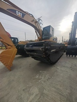Excavatrice sur chenilles amphibie d'occasion CAT 320CL, modèle original Caterpillar 320CL, pour travaux en zone humide