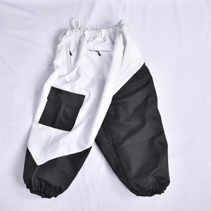 Venta al por mayor de pantalones de esquí holgados personalizados de los hombres de invierno transpirable impermeable Snowboard pantalones de esquí bolsillos con cremallera característica a prueba de viento - Product Image 6