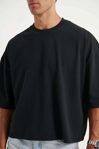 เสื้อยืดโอเวอร์ไซส์ผ้าเจอร์ซีย์คอตตอน 100% หนัก 300 กรัม สีดำล้วน สไตล์วินเทจ สำหรับผู้ชาย รุ่นซัมเมอร์นิว  แบบเรียบง่าย  รับสกรีนลาย  เป็นมิตรต่อสิ่งแวดล้อม ระบายอากาศได้ดี - Product Image 6