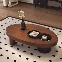 Table basse en bois moderne, style nordique minimaliste, écologique et durable, avec plateau de rangement intégré, plateau épais et pieds cylindriques bicolores
