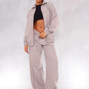 Traje Cortavientos Impermeable para Mujer, Conjunto de 2 Piezas, Spandex/Nylon, Resistente al Viento, Estampado Sólido, Logotipo Personalizado, Estilo Urbano, Duradero, OEM - Product Image 1