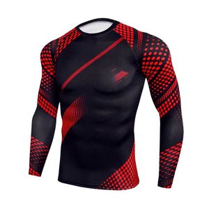 Maillot de compression sublimé rouge et noir à manches longues pour la performance athlétique, en tissu sport respirant et extensible - Product Image 1