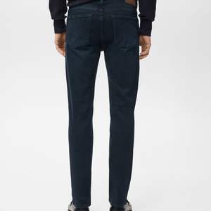 กางเกงยีนส์พรีเมียมสำหรับผู้ชาย ออกแบบมาเพื่อแฟชั่นเดนิมและสตรีทแวร์ ผู้ผลิตแบบ OEM ODM กางเกงยีนส์ทรงปกติสำหรับผู้ชาย - Product Image 6