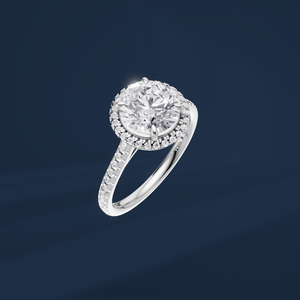 Bague de fiançailles en platine avec diamant rond brillant, halo et diamants latéraux, certifiée IGI, style classique pour femme - Product Image 1