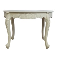 Ensemble de salle à manger de style français Table à manger ronde en bois avec quatre chaises conçues pour les meubles de restaurant à la maison européens peints en blanc