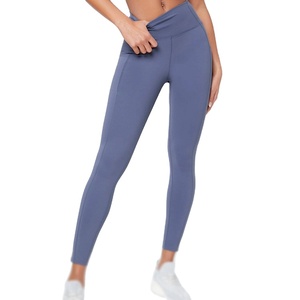 Leggings de yoga sans couture respirants écologiques à la conception personnalisée Taille haute pour femmes avec poches - Product Image 1