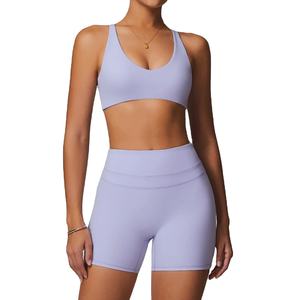 Ensemble de sport de gymnastique à séchage rapide pour femmes 2 pièces Costume de yoga à motif solide avec survêtement d'entraînement à manches courtes pour la course à pied Logo sur le devant - Product Image 1