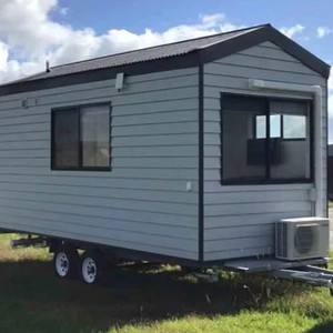 Casa Contenedor Modular Moderna Portátil sobre Ruedas con Cocina, Baño y Espacio para Dormir, Cabaña Móvil - Product Image 1