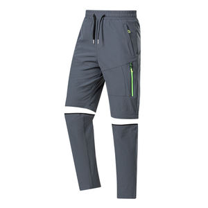 Pantalones de Senderismo Negros Convertibles con Bolsillos con Cremallera y Detalles Verdes para Actividades al Aire Libre - Product Image 3