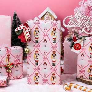 Papel de Regalo Navideño Color Rosa Pastel con Diseño de Lazo Femenino Reversible para Regalos con Temática Femenina y Papel de Envolver y Cartulinas - Product Image 1
