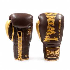 Gants de boxe en cuir de qualité supérieure, couleur or, personnalisables, avec fermetures auto-agrippantes réglables, pour le kick-boxing et les arts martiaux. - Product Image 6
