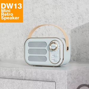 Nuevo Altavoz Inalámbrico Portátil Retro de Plástico con Bajos, Mini Reproductor para el Hogar con Sonido Potente y Función de Radio Integrada - Product Image 1