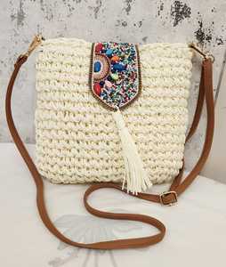 Artisanal Woven Cream Handbag featuring Vibrant Beaded Flap and Adjustable Faux Leather Strap - Product Image 1