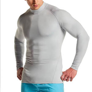 Camiseta deportiva de nailon con logotipo personalizado de spandex para hombre, ropa de gimnasio, camisetas de protección contra erupciones cutáneas para hombre, ropa de artes marciales, traje de baño. - Product Image 1