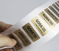 Autocollants personnalisés en feuille d'or, finition brillante, papier imperméable, certifiés RoHS pour l'électronique grand public - Logo noir