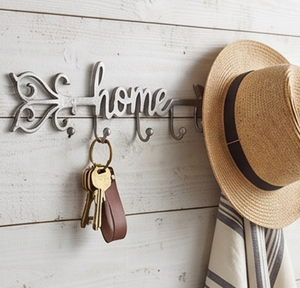 El mejor gancho de pared con diseño de flecha en metal plateado con acabado pulido a espejo, perfecto para un almacenamiento elegante de abrigos y toallas en el hogar. - Product Image 5