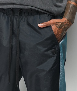 Pantalon de survêtement pour homme à blocs de couleur avec bande latérale, taille élastique et cordon de serrage, décontracté, respirant, en polyester, pour l'automne - Product Image 4