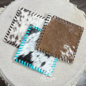 Sous-verres de luxe faits main de style western en cuir de vachette à poils, doux et résistants à la chaleur, pour les salons de thé et les cafés. - Product Image 1