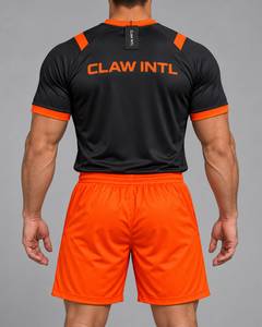 Maillot de football CLAW INTL pour homme, noir et orange, imprimé par sublimation, col rond, manches courtes, évacuation de l'humidité, polyester, coupe athlétique - Product Image 6