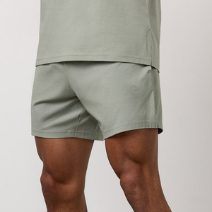 Shorts de plage décontractés pour hommes, couleur unie, imperméables, avec cordon de serrage, respirants, en toile tricotée, taille mi-haute, en stock - Product Image 1