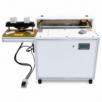 Machine à rainurer pneumatique semi-automatique pour la fabrication de boîtes rigides