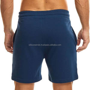 กางเกงขาสั้นผ้าฝ้ายสีทึบเอวปานกลางแบบลำลองสำหรับผู้ชายจากปากีสถานทำจากผ้าฝ้าย100% - Product Image 1