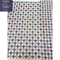 Tela de malla bordada con textura geométrica para la confección de vestidos modestos, abayas, caftanes y prendas de moda.