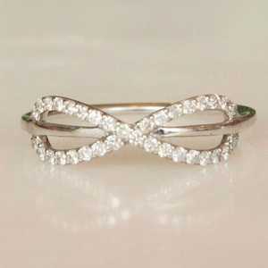 แหวนมอสซาไนต์ทรงกลมแบบไขว้ลายอินฟินิตี้ เงินแท้ 925 เครื่องประดับแบบซ้อนได้ ของขวัญสำหรับแฟนสาว - Product Image 1