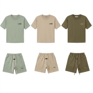 Ensemble t-shirt et short en coton pour homme, couleur unie, col rond, vêtements décontractés d'été avec impression de logo, tissu tricoté respirant - Product Image 1