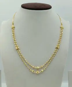 Exquisito Collar de Doble Capa Chapado en Oro de 22K con Cuentas de Oro y Diseño de Cadena Ornamentada Elegante para Mujer con Textura Intrincada - Product Image 1