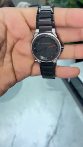 Reloj de cuarzo para hombre de lujo en acero inoxidable negro con bisel de diamantes de imitación plateados, esfera de 40 mm y correa de 20 mm. - Product Image 4